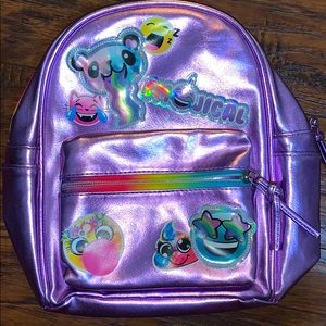 Claire’s purple shimmery mini backpack